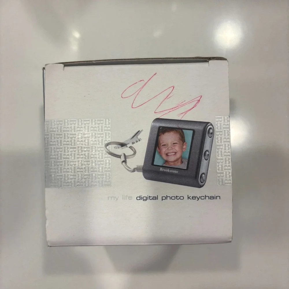 Brookstone My Life Digital Photo Keychain Picture Display USB Rechargeable